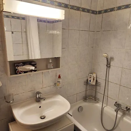 In Shared Quarto em Acomodações Particulares *
